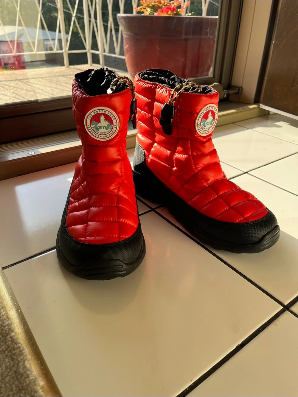 The North Face Men’s Red Puffer Winter Boots